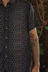 Image of man wearing fractal of ash button up digital print shirt from Tantrika Australia