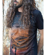 mens screen print tee with a man on moutains
