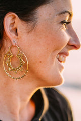 brass earrings with large spiral hoop