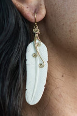 bone caved feather and brass swirl earrings