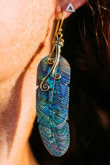 caved paua shell feather with brass findings 