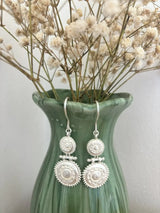 white brass earrings by nakila