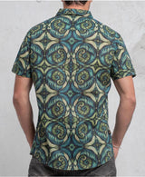 man wearing 100% cotton sprial leaves print button up shirt