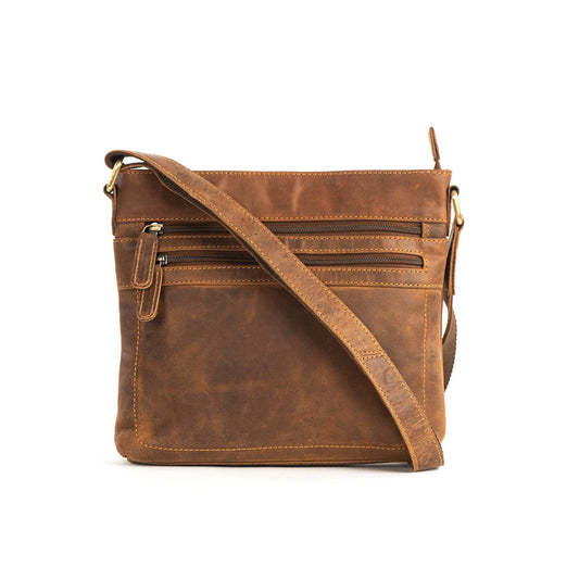 Brown leather crossbody bag on a white background