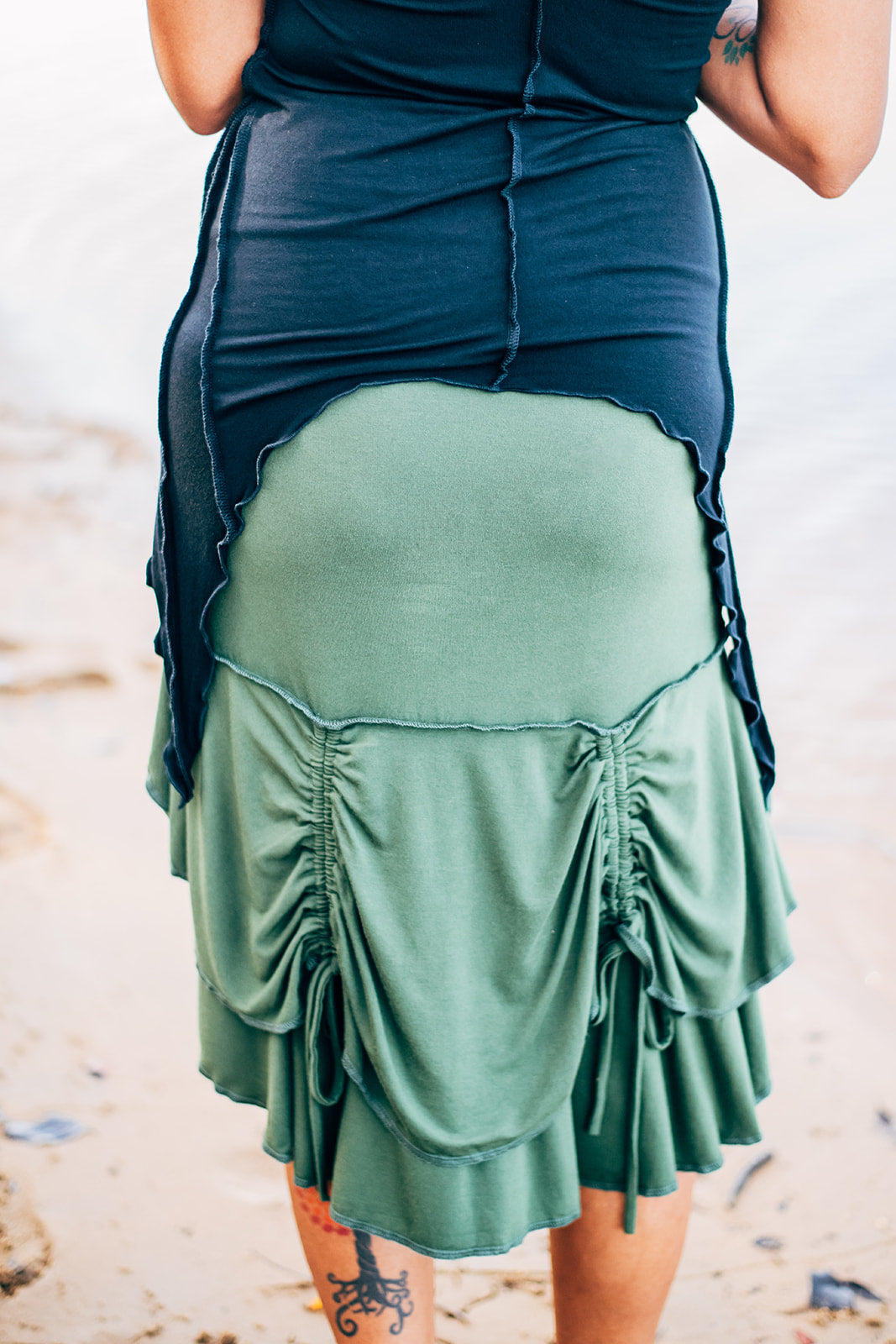 ladies skirt high in the front and low in the back