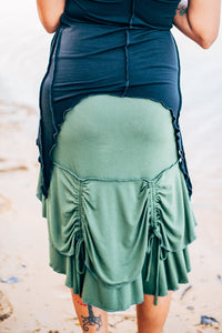 ladies skirt high in the front and low in the back