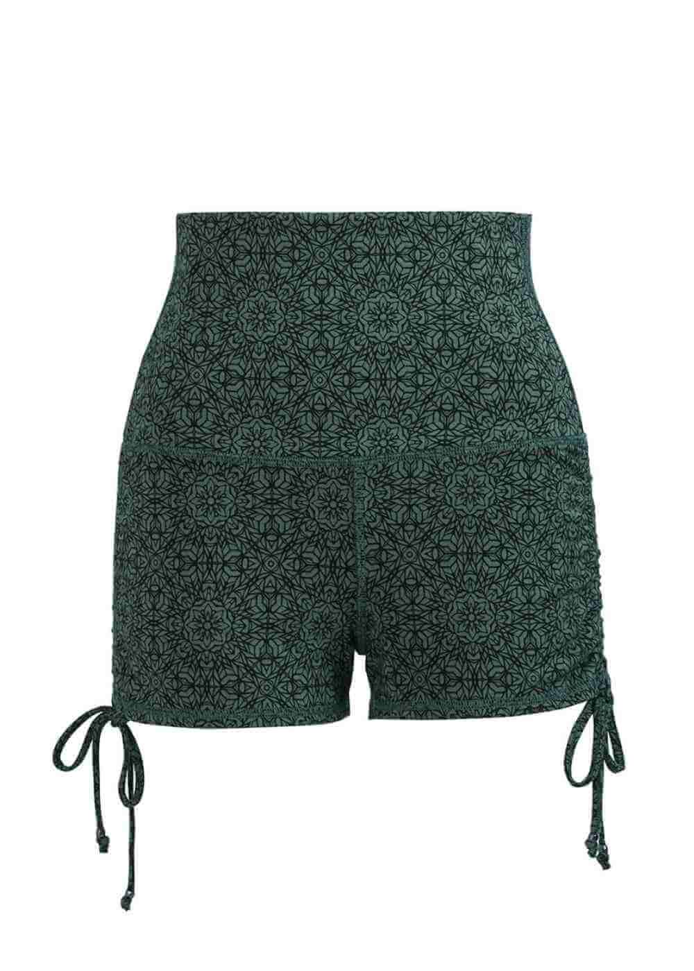 Green patterned shorts with drawstring on a white background