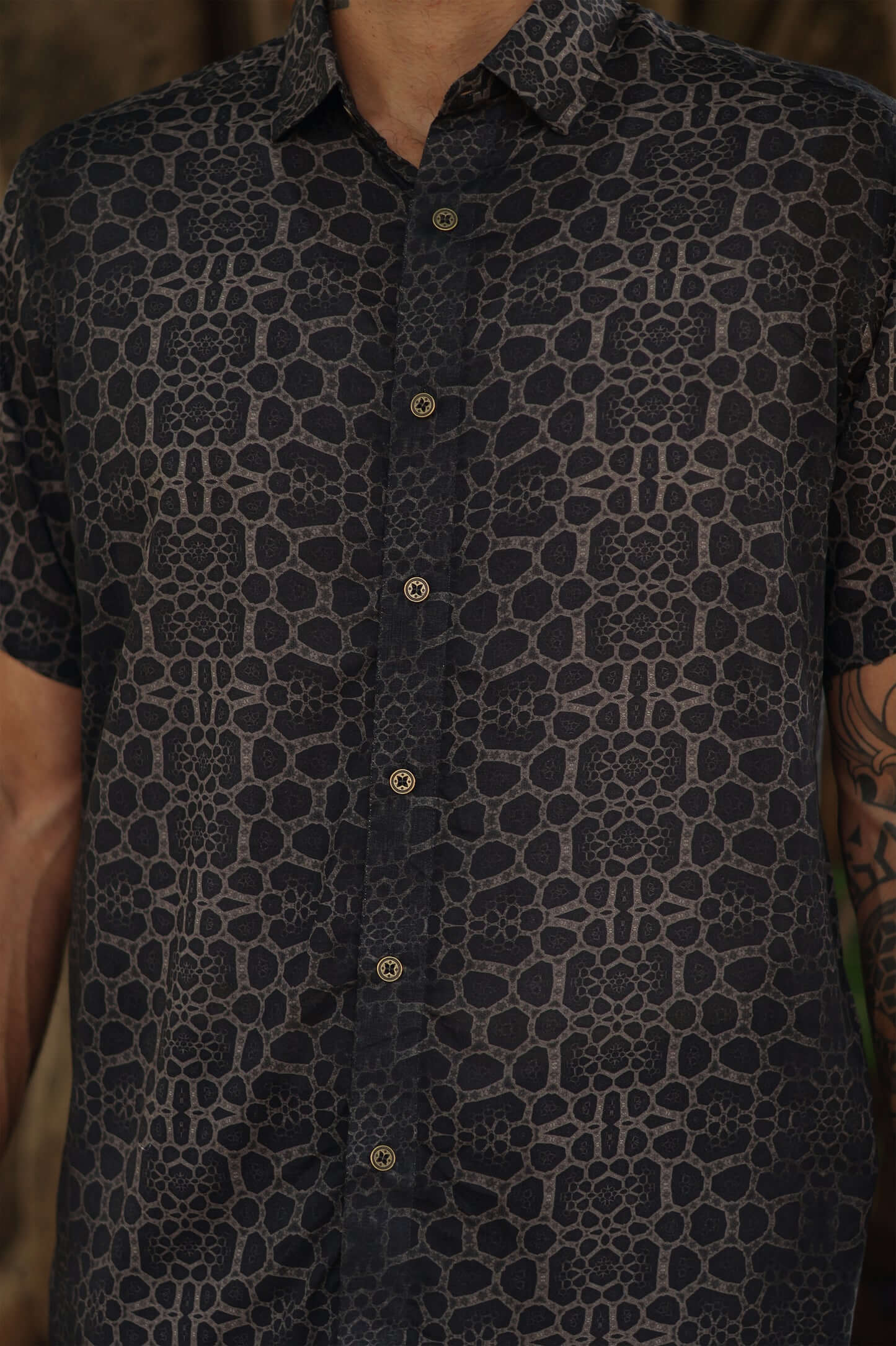 Image of man wearing fractal of ash button up digital print shirt from Tantrika Australia