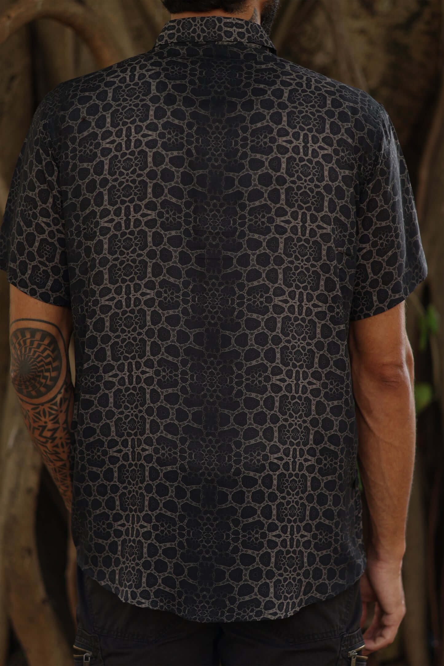 Image of man wearing fractal of ash button up digital print shirt from Tantrika Australia