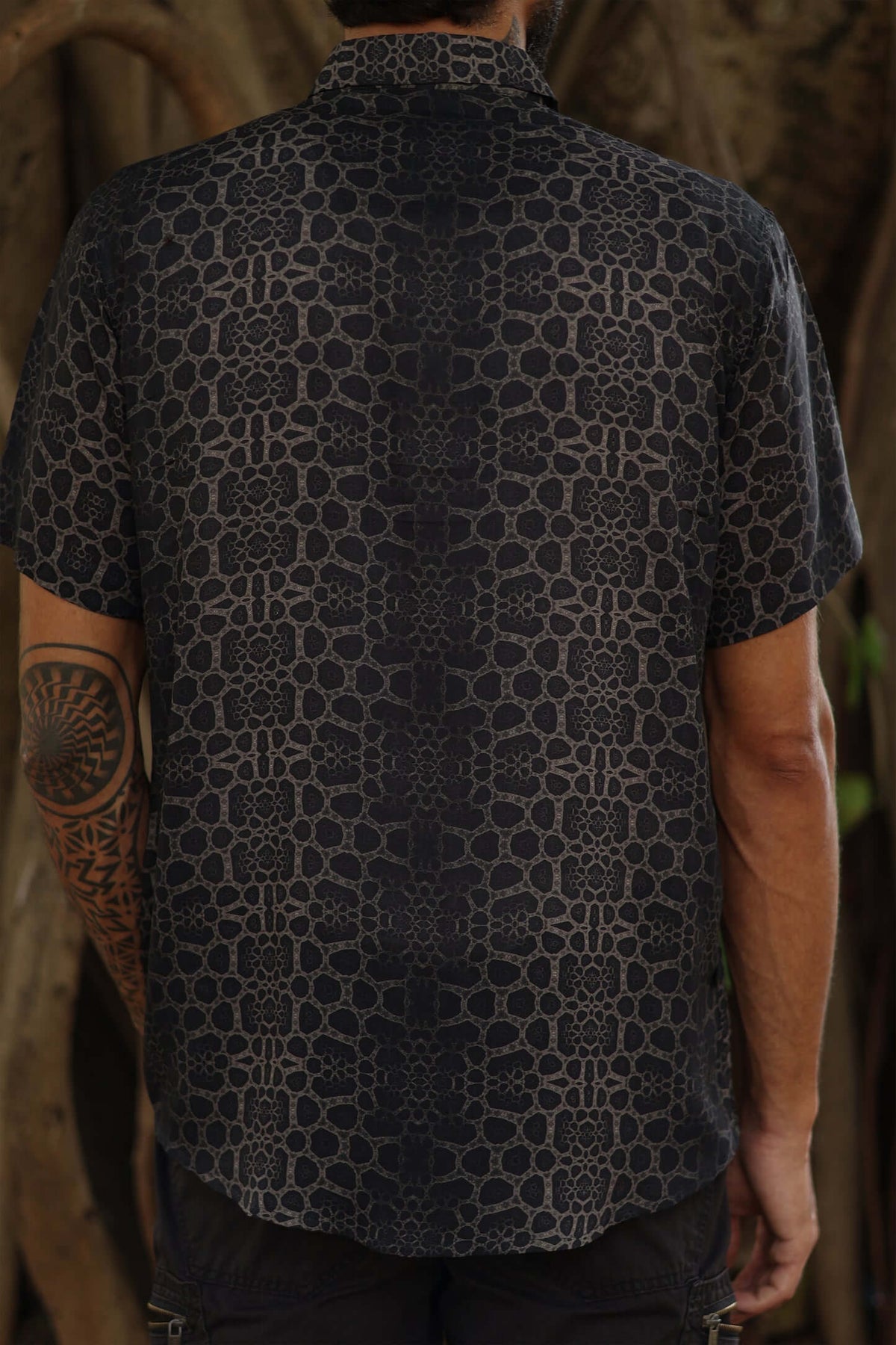 Image of man wearing fractal of ash button up digital print shirt from Tantrika Australia
