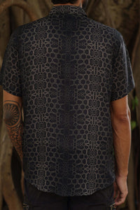 Image of man wearing fractal of ash button up digital print shirt from Tantrika Australia