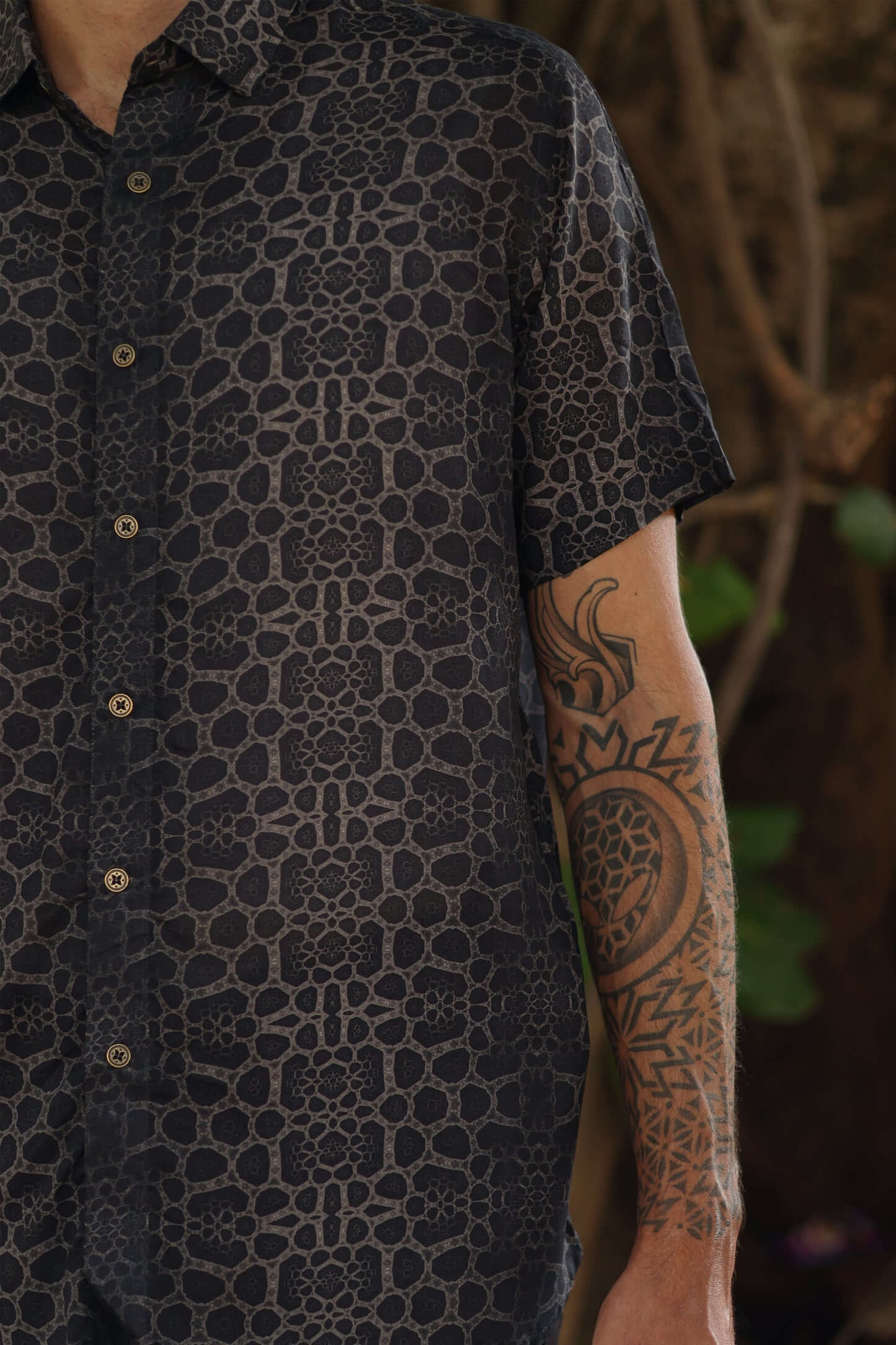 Image of man wearing fractal of ash button up digital print shirt from Tantrika Australia