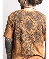 Person wearing a brown t-shirt with geometric designs on the back