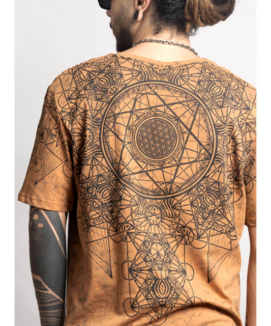 Person wearing a brown t-shirt with geometric designs on the back
