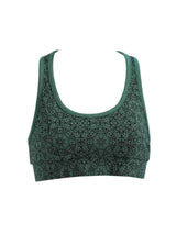 Green patterned sports bra on a white background