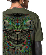 Person wearing a green t-shirt with a detailed frog-like creature design on the back.