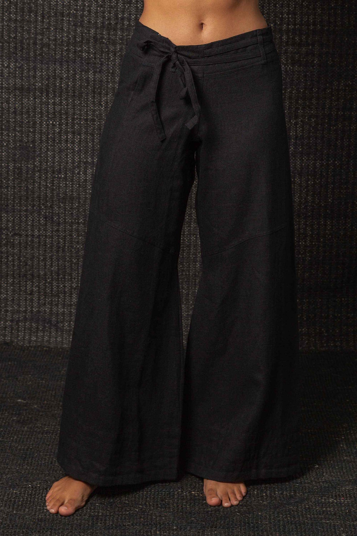 black pants with dark background
