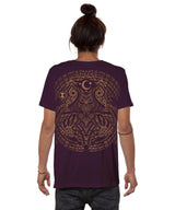 Person wearing a purple t-shirt with a detailed design on the back, standing against a white background