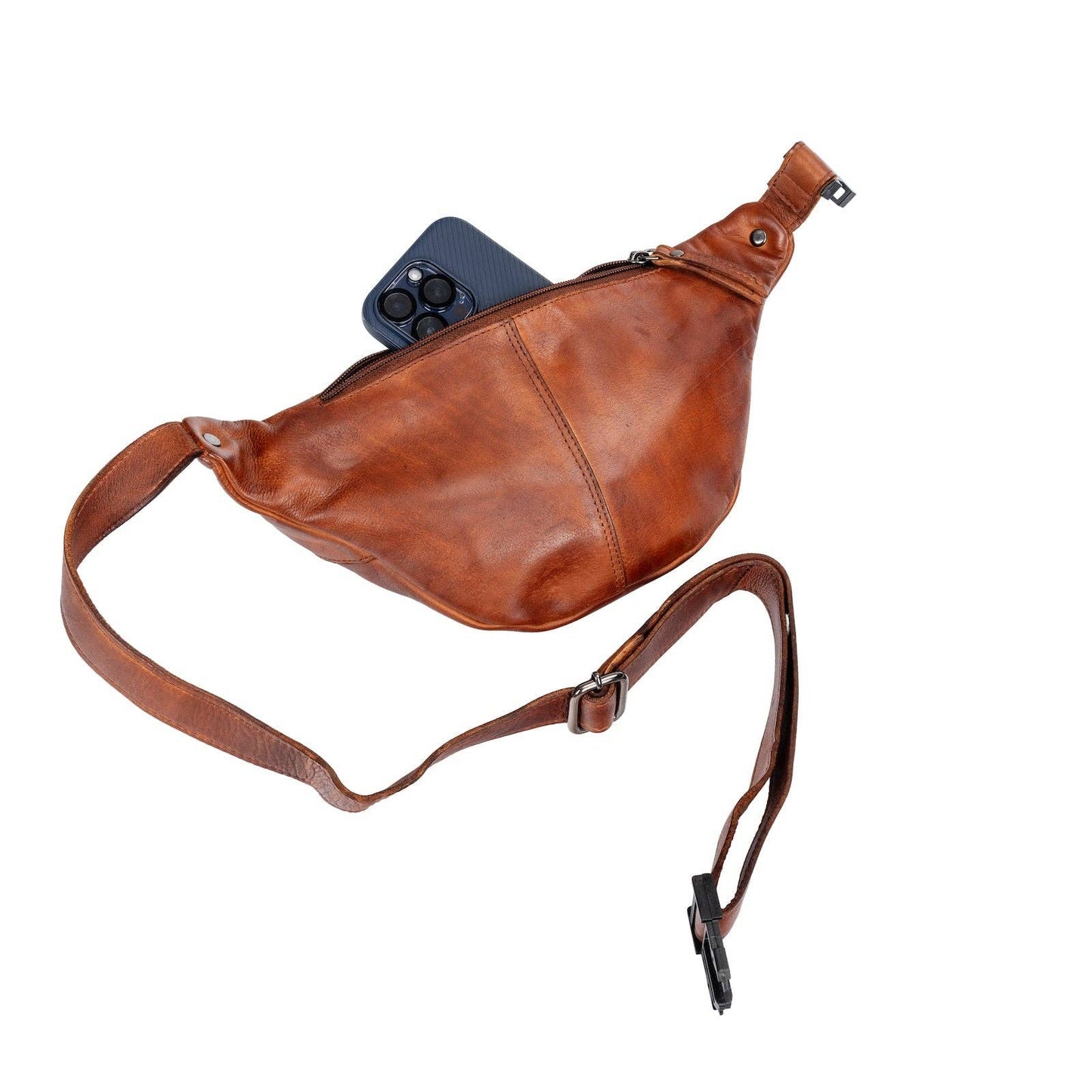 Brown leather waist bag with a phone inside on a white background