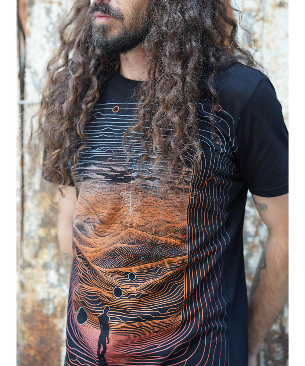 mens screen print tee with a man on moutains
