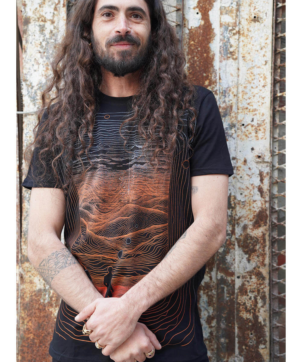 mens screen print tee with a man on moutains