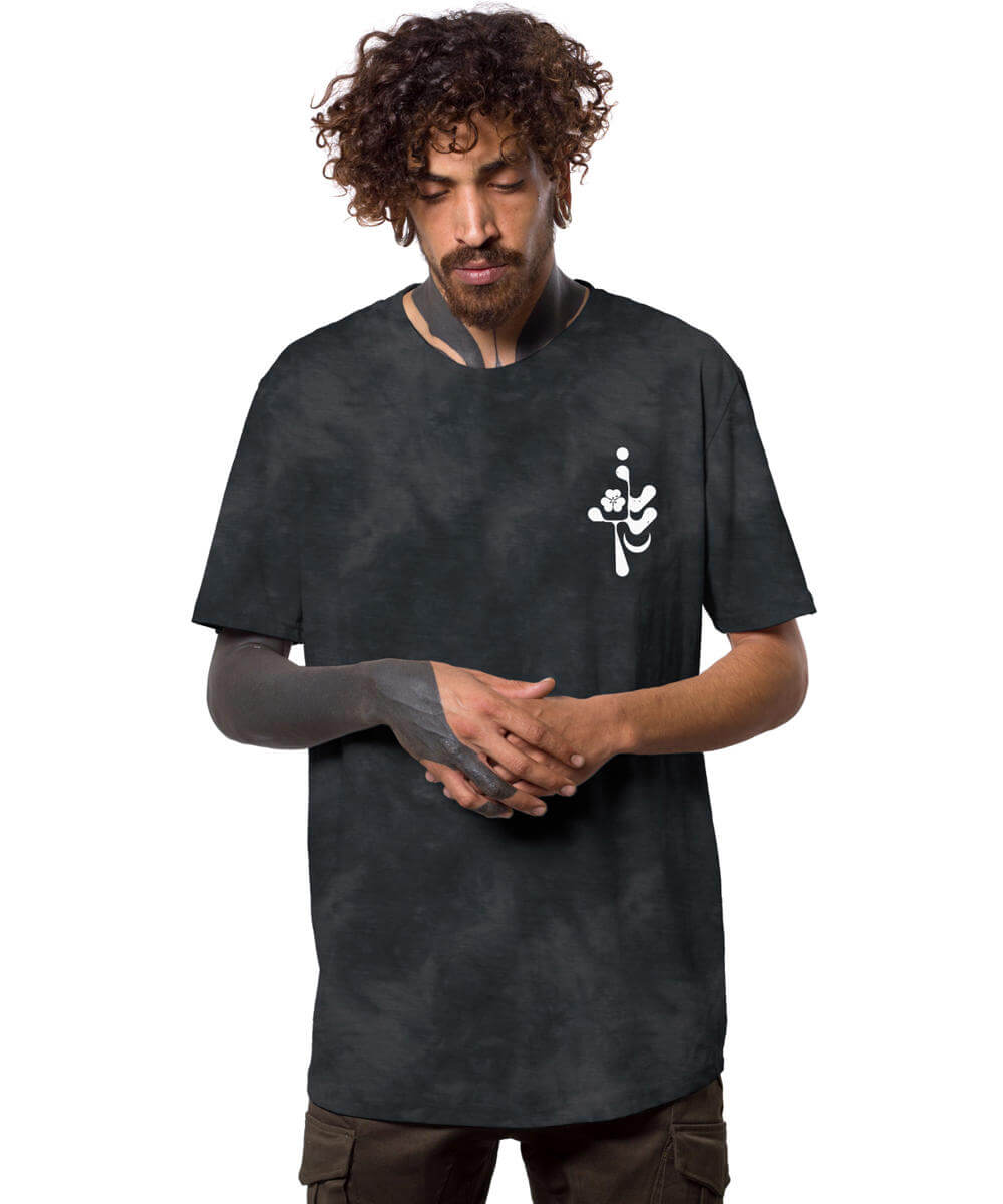 Man wearing a black t-shirt with a white logo on a white background
