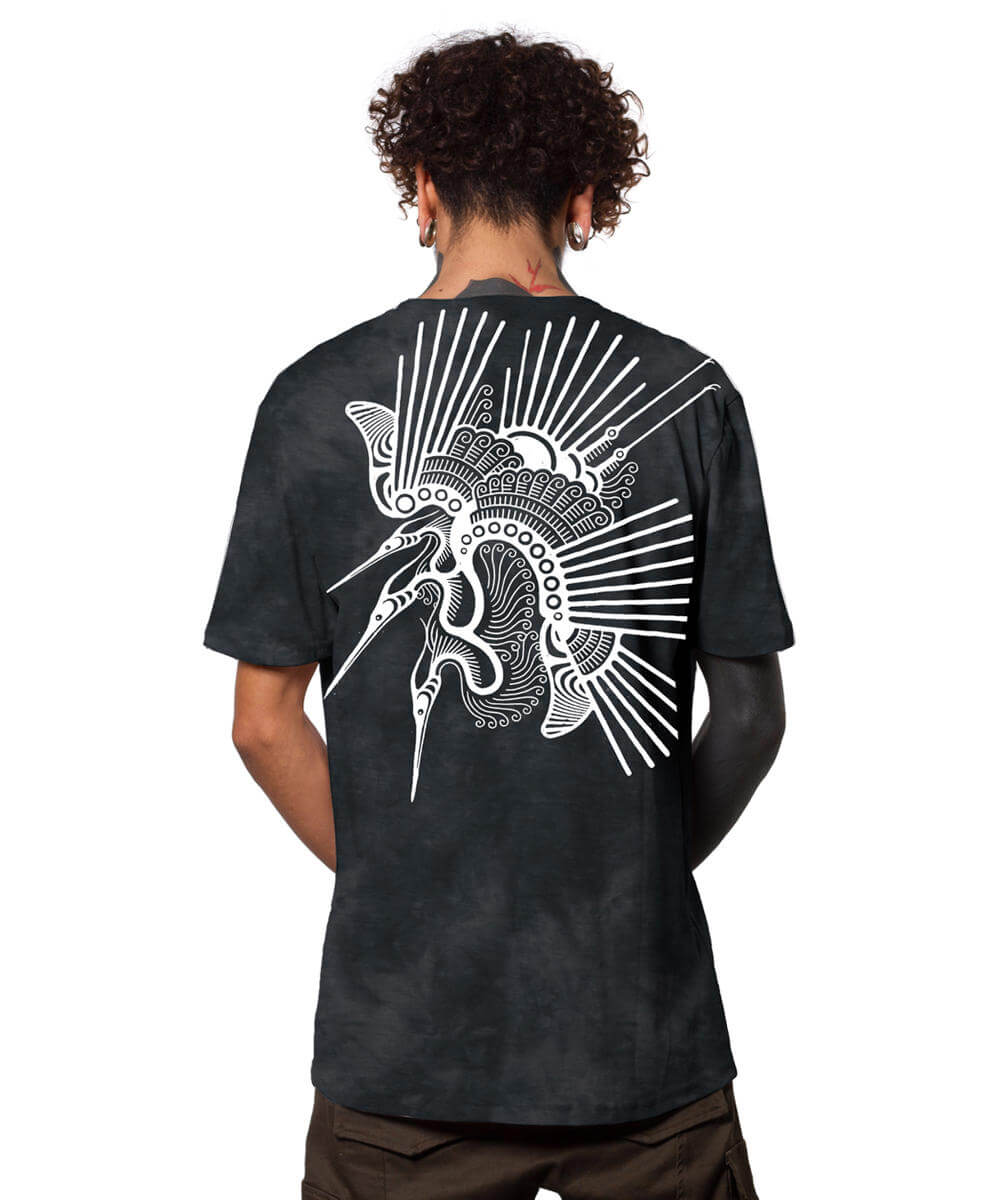 Person wearing a black t-shirt with a white abstract design on the back, on a white background