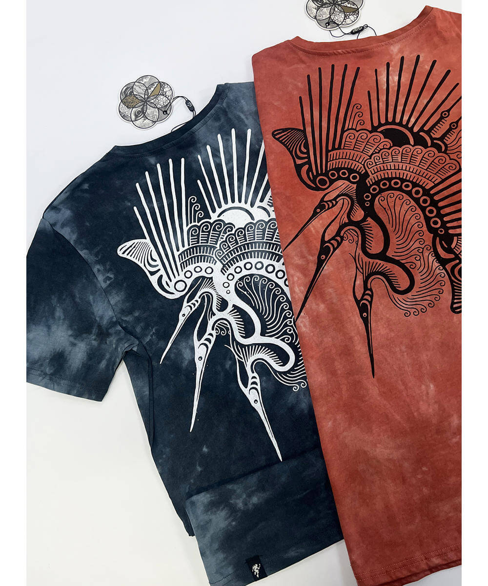 Two t-shirts with abstract designs on a white background