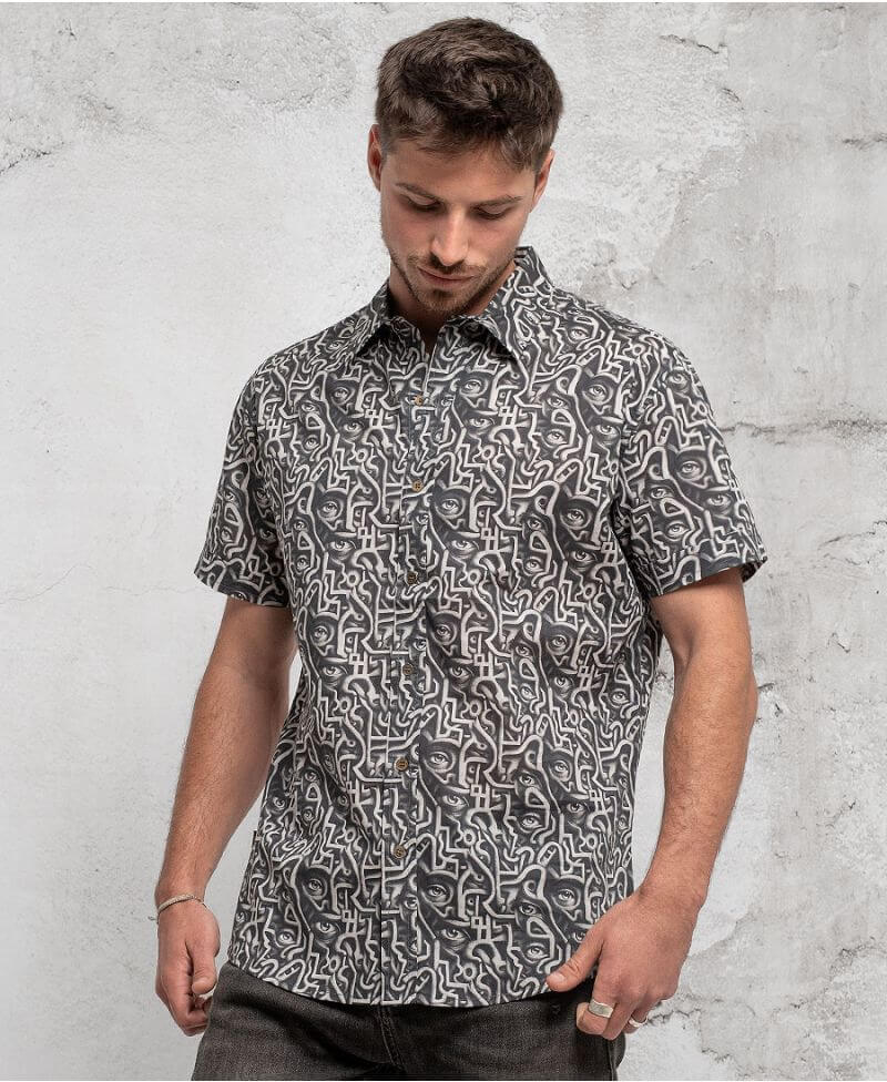 man in trippy print shirt with hidden eyes  made from 100% cotton
