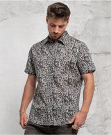 man in trippy print shirt with hidden eyes  made from 100% cotton
