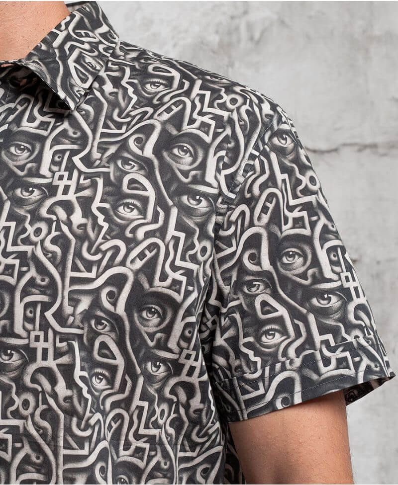 man in trippy print shirt with hidden eyes  made from 100% cotton