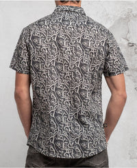 man in trippy print shirt with hidden eyes  made from 100% cotton