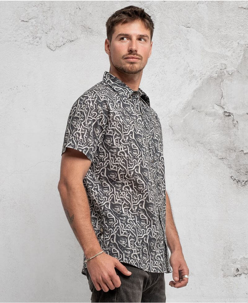 man in trippy print shirt with hidden eyes  made from 100% cotton