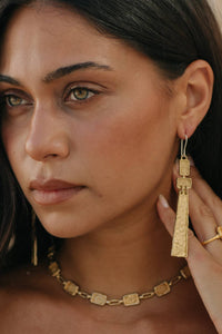 Ayana Earrings - Brass worn as long textured statement drop earrings