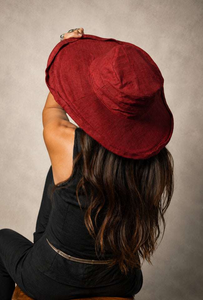 Bangalow Sun Hat in black featuring a broad hemp brim, adjustable fit and UV protection for sunny outdoor days.