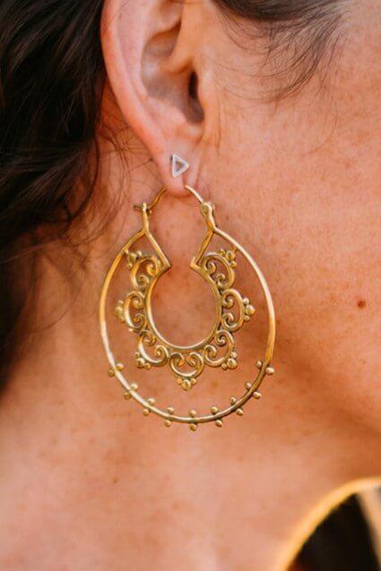 brass earrings with large spiral hoop