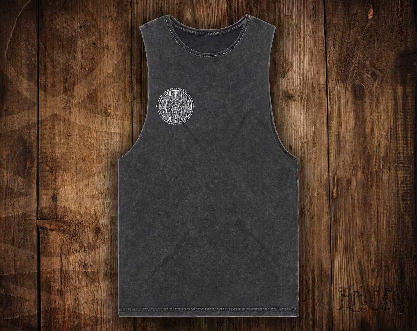 Black tank top with a geometric design on a wooden surface