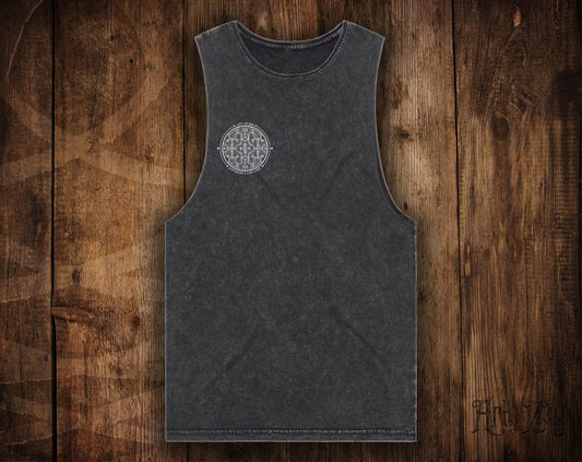 Black tank top with a geometric design on a wooden surface
