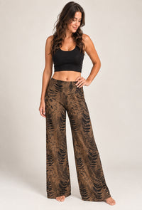 Fern Pants brown botanical print wide-leg pants flat lay