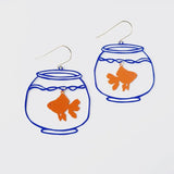 Pair of earrings with goldfish in bowls on a light gray background