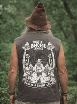 Man wearing a sleeveless shirt with a gnome-themed design in a forest setting