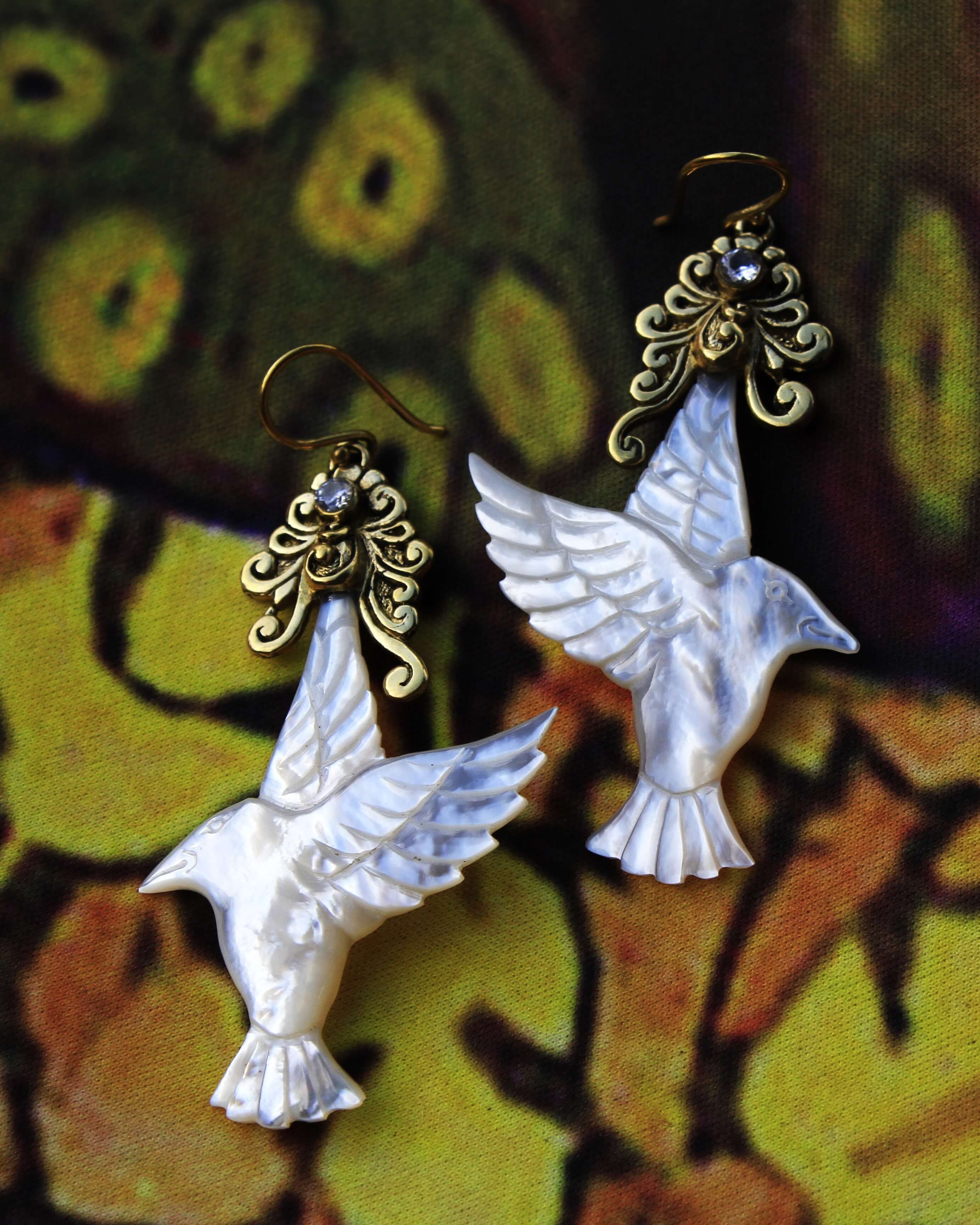 humming bird earrings carved from mother of pearl and brass findings
