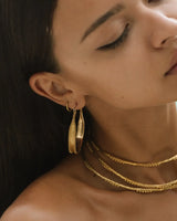 indra brass hoops by nakila collective