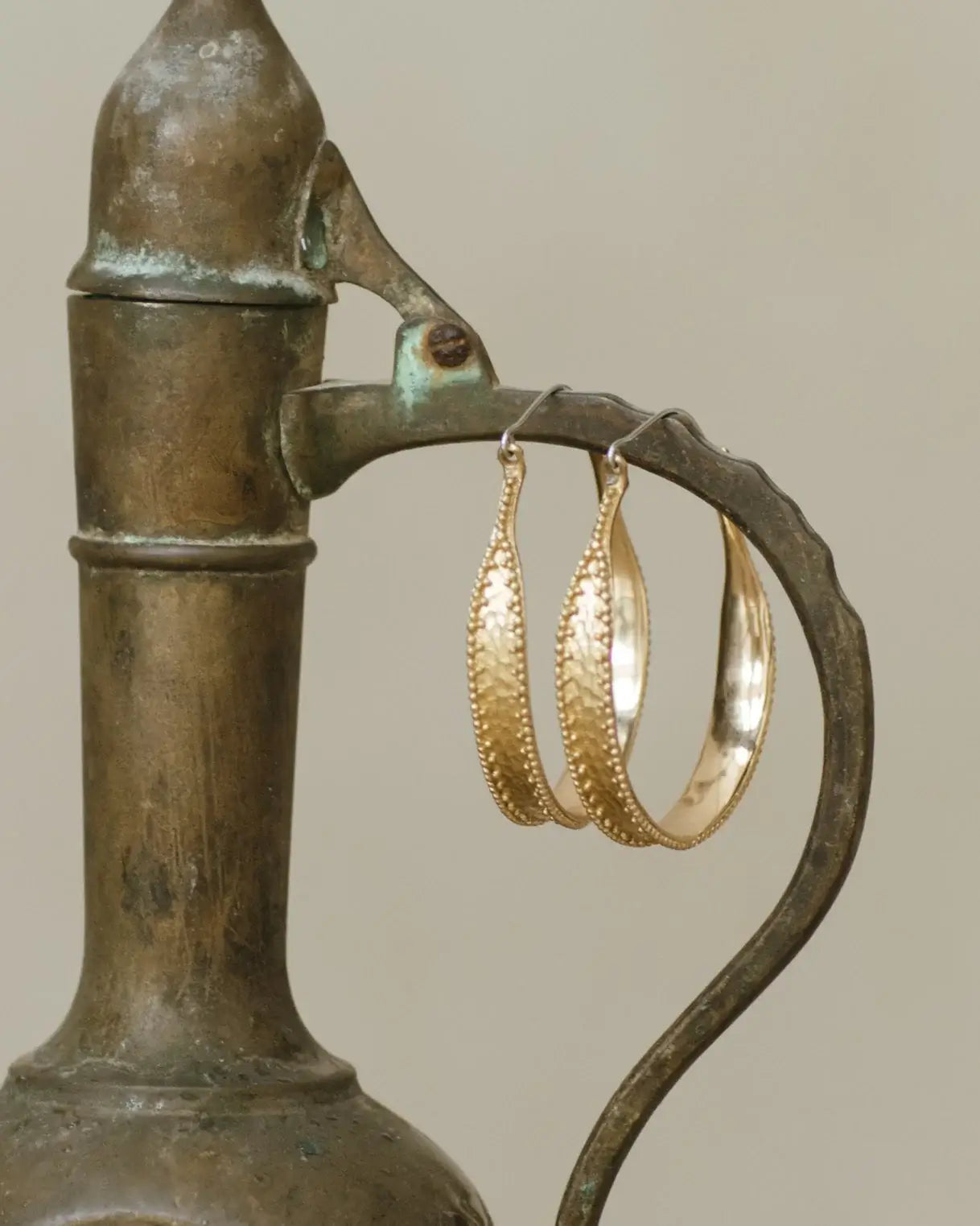 indra brass hoops by nakila collective