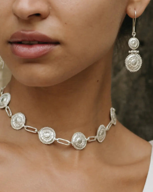 white brass earrings by nakila