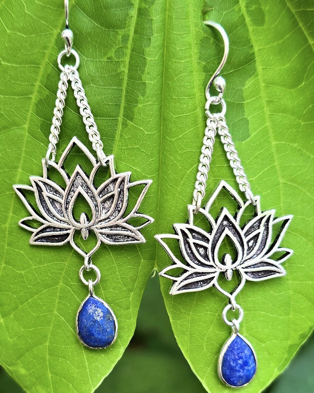 silver metal lotus float earring with lapis 