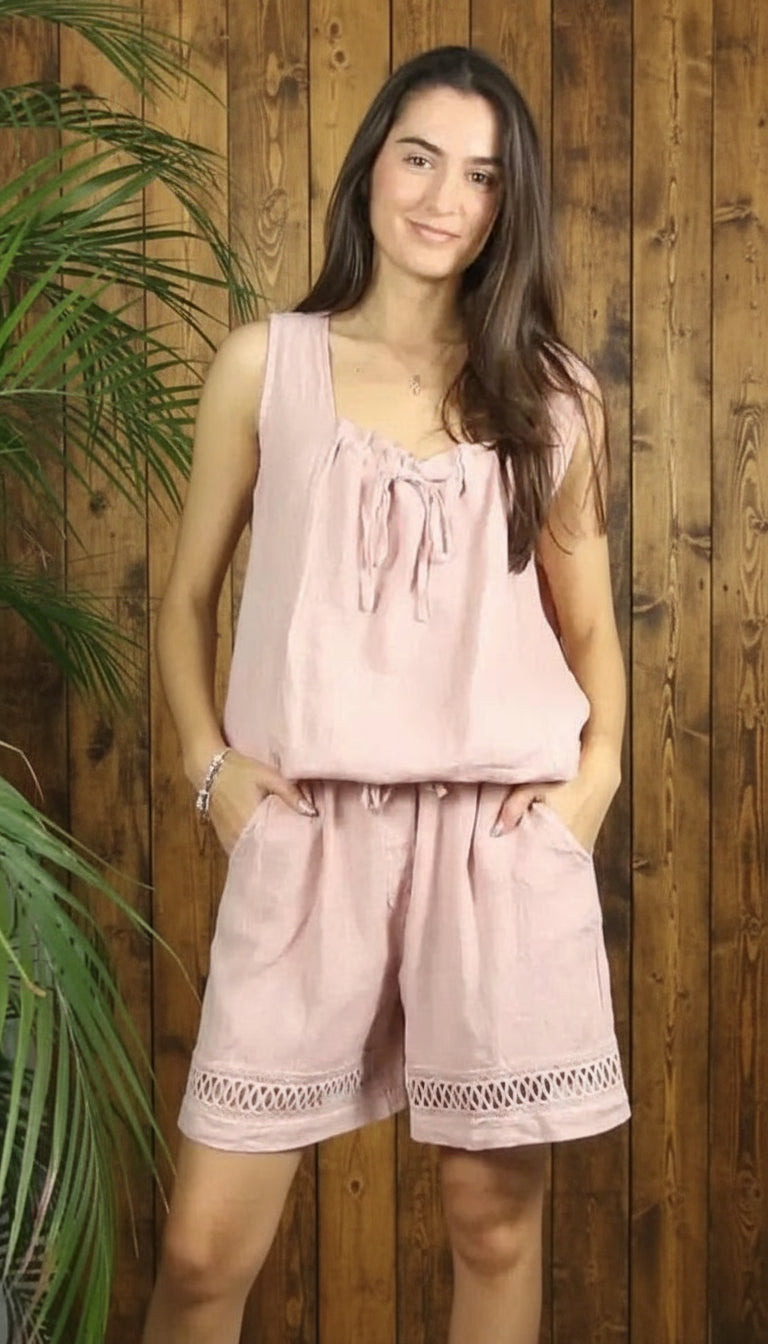 LADY WEARING ROSE LINEN SHORTS WITH A ROSE COLOUT TOP
