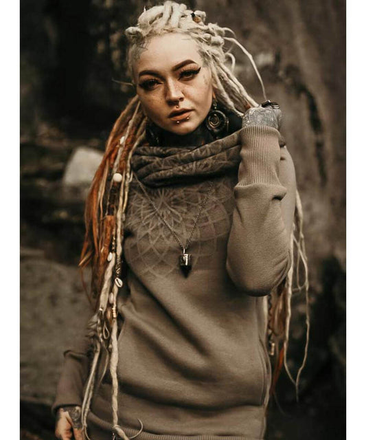 WOMAN WEARING JUMPER IN NATURAL SETTING 