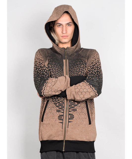 Person wearing a brown and black patterned hoodie on a white background