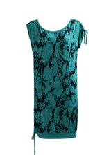 Teal dress with black abstract pattern on a white background